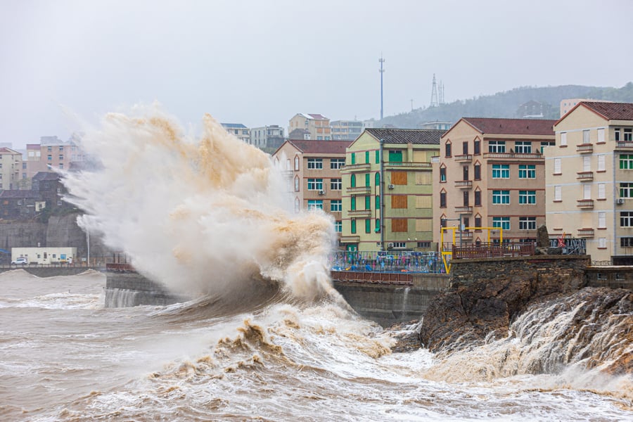 Large waves crash over coastal road barriers in western Guangdong during Typhoon Ragasa