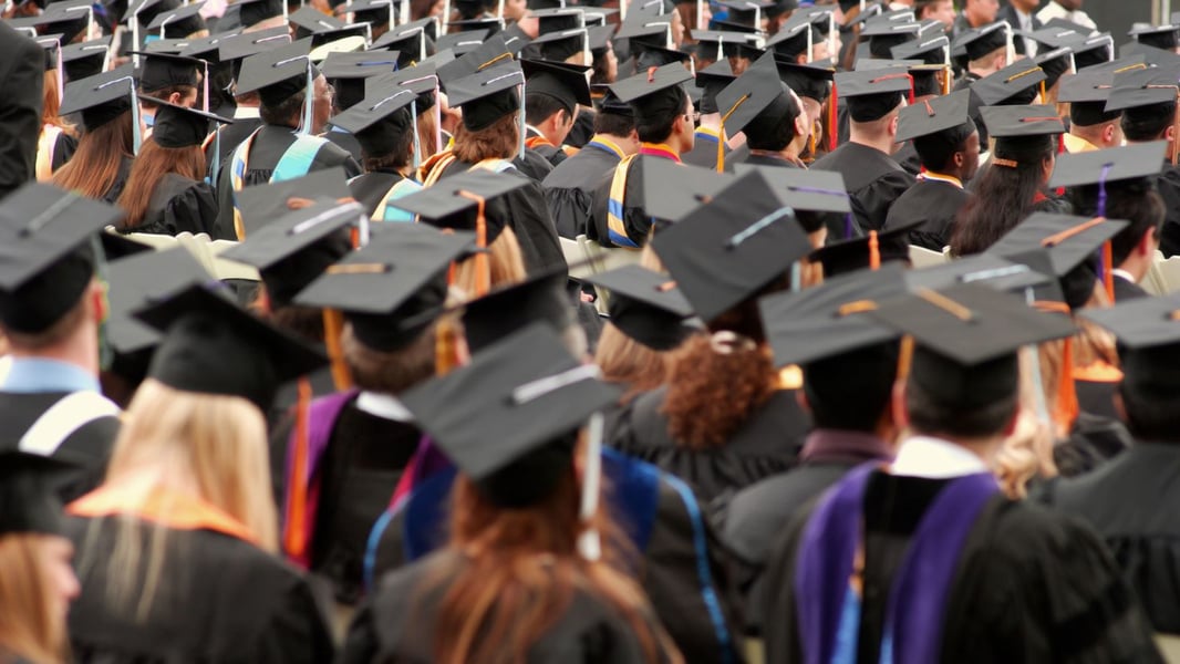 International Students And The H-1B Pipeline International students at a US campus graduation amid H-1B uncertainty
