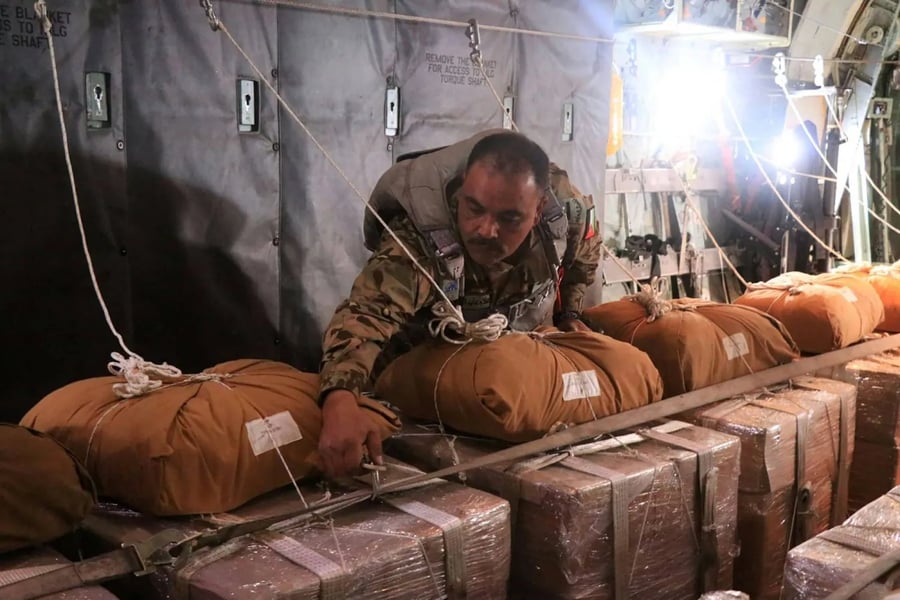 Jordan Air Force Airdrop To Gaza Jordan Air Force aircraft airdropping humanitarian aid into Gaza