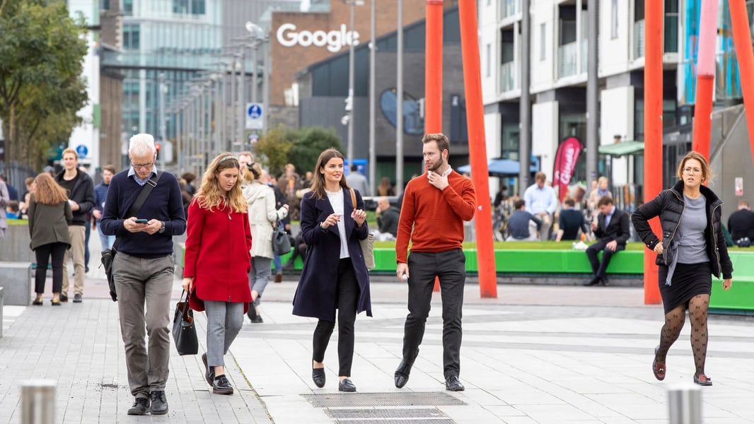 Microsoft and Google employees at headquarters during H-1B visa policy shock