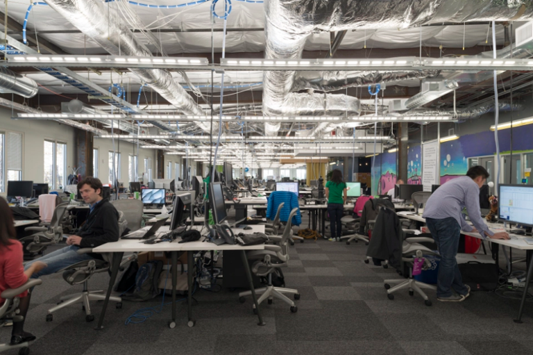 International Students And The H-1B Pipeline Engineers at work in a US tech office as companies rethink hiring under H-1B changes