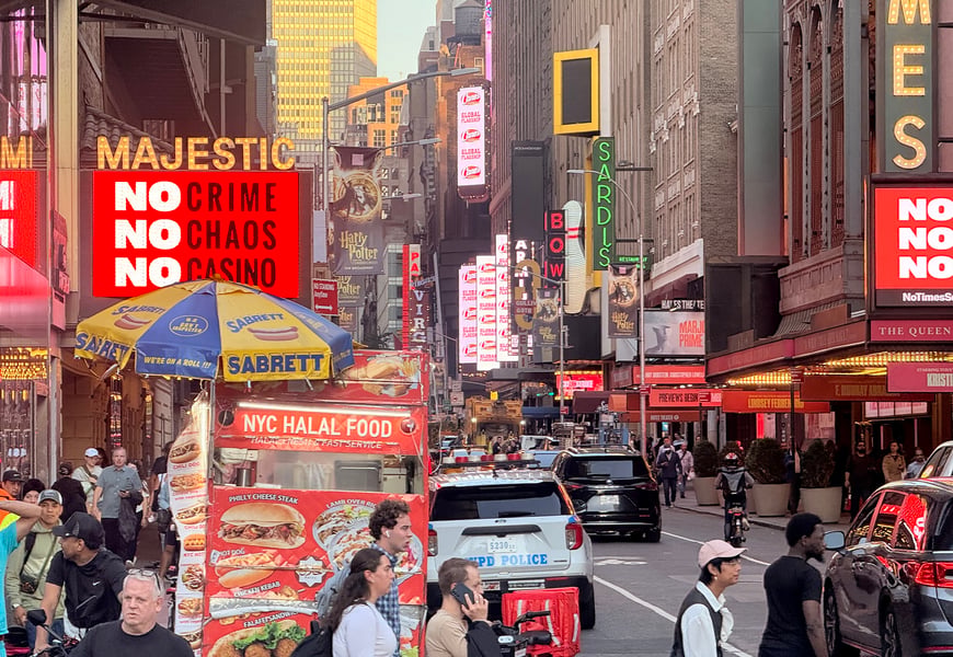 Times square street view showing Broadway theaters, highlighting rejected Caesars Palace and Avenir casino projects