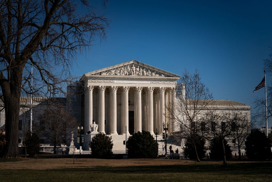 Courtroom gavel representing lawsuits against Trump’s H-1B visa fee