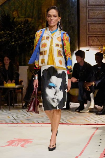 Versace Spring 2026 — Slouchy Tailoring Versace Spring 2026 runway look with slouchy tailoring in electric blue.