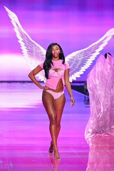Angel Reese makes her Victoria’s Secret runway debut with custom wings in Brooklyn.