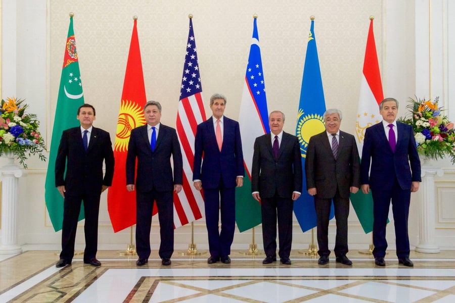 Central Asian leaders at a regional summit Central Asian leaders stand with flags at a regional summit venue