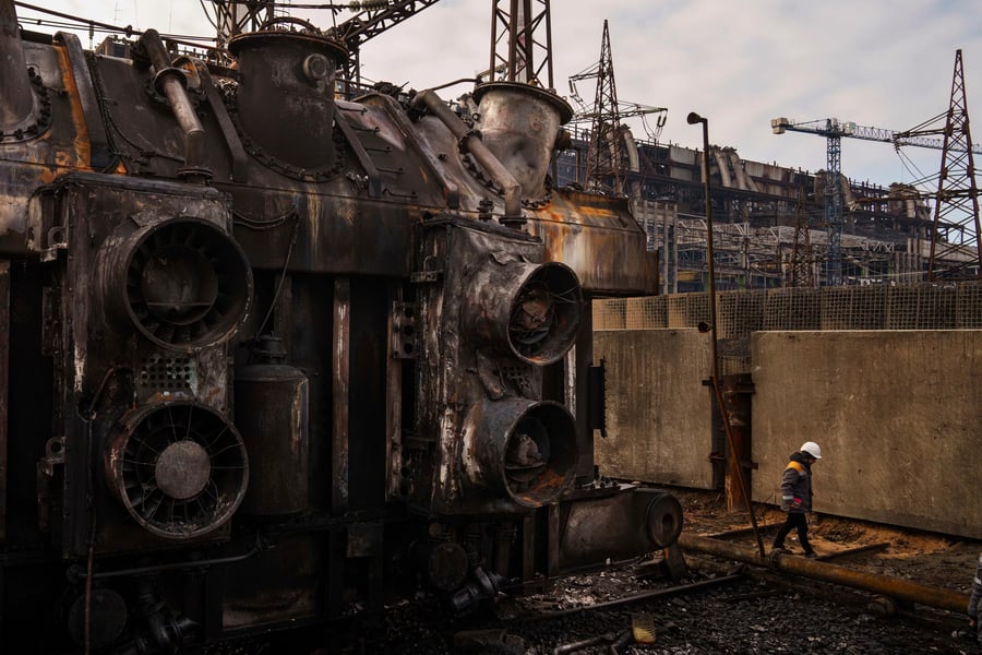 Odesa repair crew restores a substation after overnight strikes during nationwide power cuts.