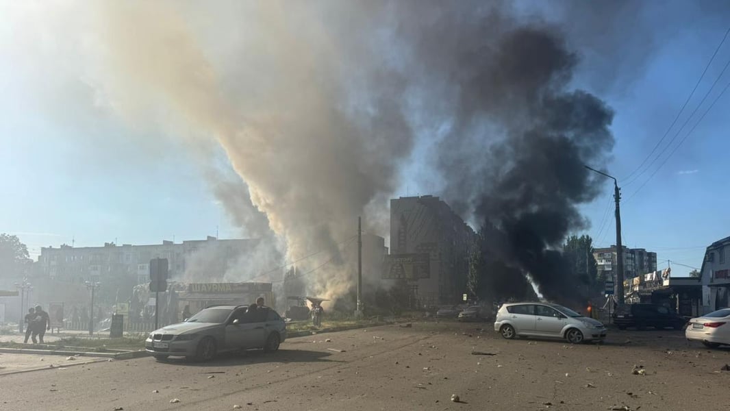 Smoke rises above the Sigma shopping center in occupied Donetsk after an evening strike.