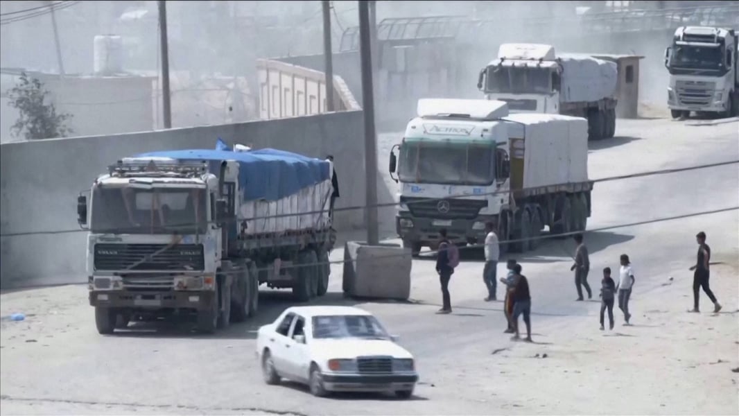 Aid trucks line up at Rafah crossing as corridor schedules are prepared under the first phase ceasefire