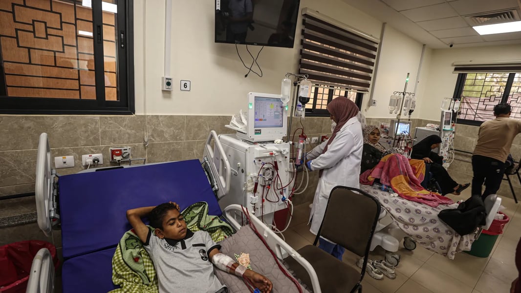 Hospital technicians check a generator and oxygen plant to keep wards running during limited fuel windows