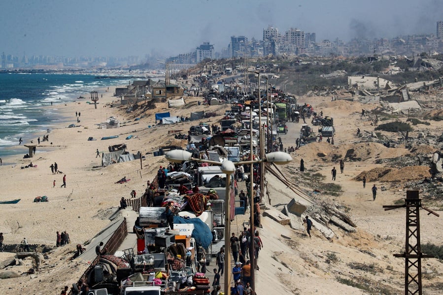 Civilians displaced along coastal road in Gaza amid Israeli bombardment