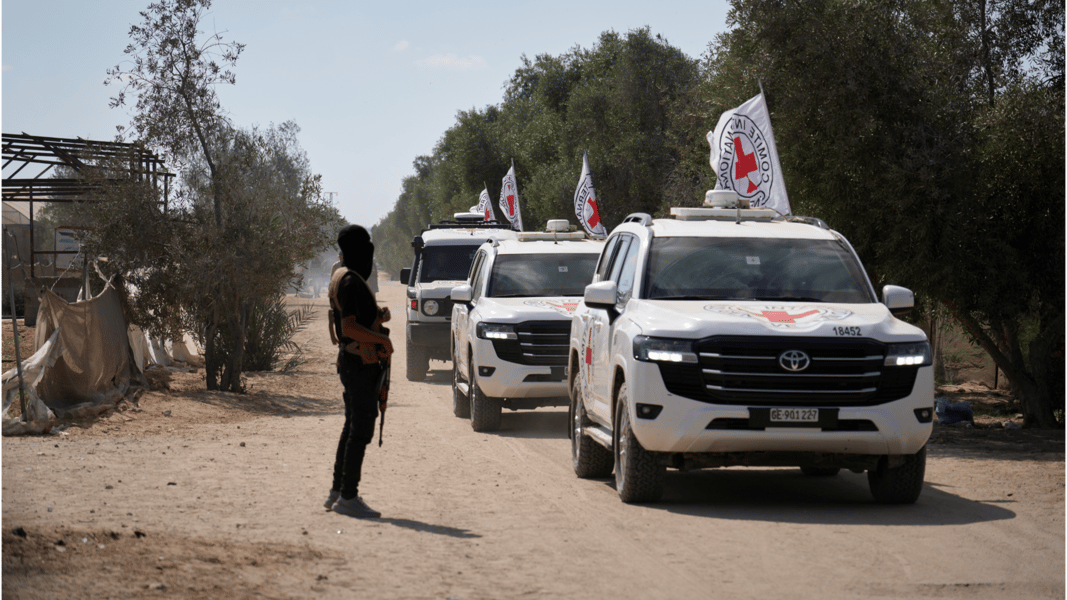 ICRC convoy drives through a damaged Gaza neighborhood during facilitation work