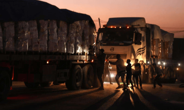 Aid trucks queue at Kerem Shalom crossing during ceasefire checks as fuel and medical supplies enter Gaza