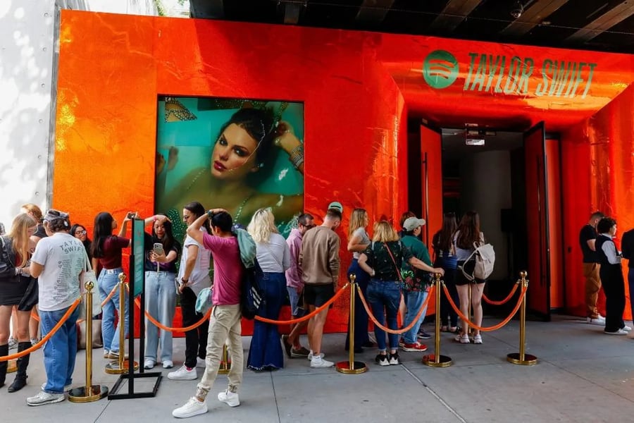 Fans line up at a release-night pop-up for The Life of a Showgirl
