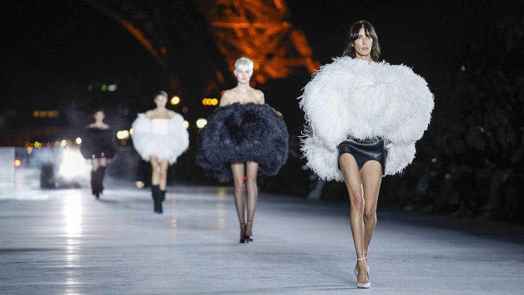 Closeup of a Saint Laurent tailored jacket with squared shoulders on the Paris runway