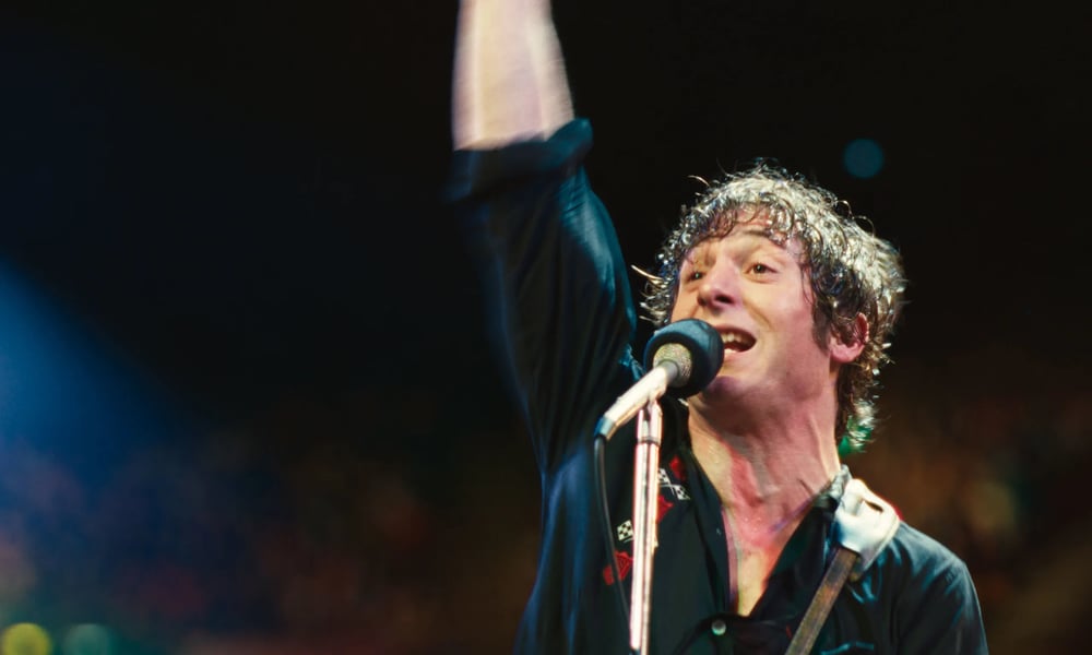 Jeremy Allen White performs as Bruce Springsteen in a concert scene from Springsteen: Deliver Me From Nowhere.