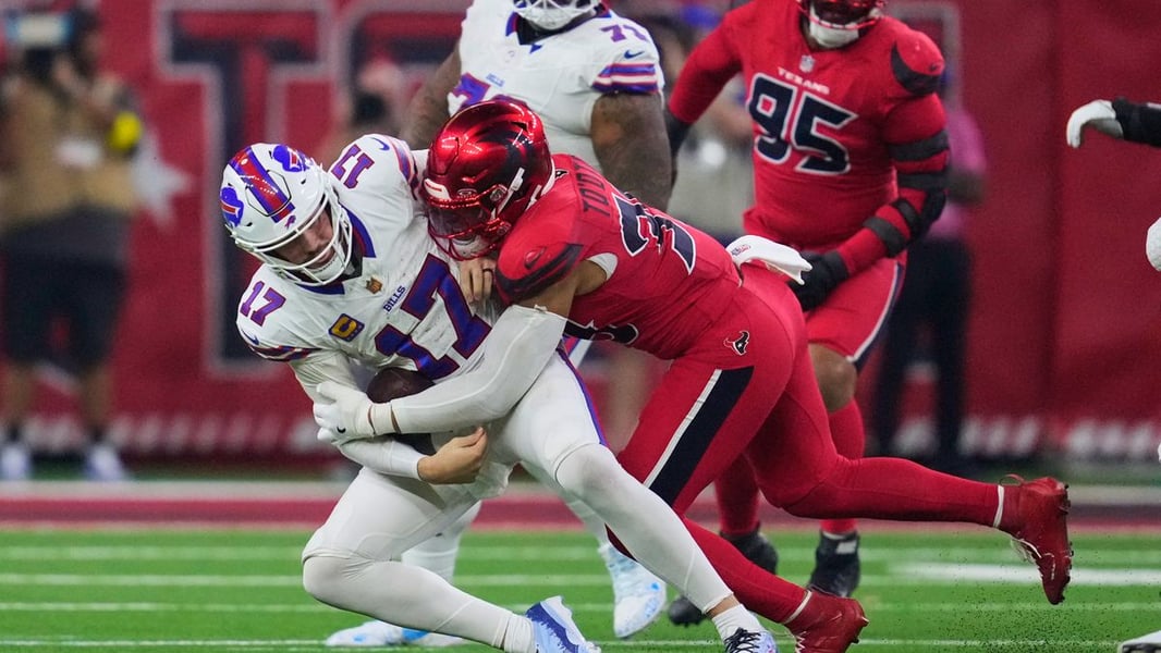 Calen Bullock intercepts a pass from Josh Allen