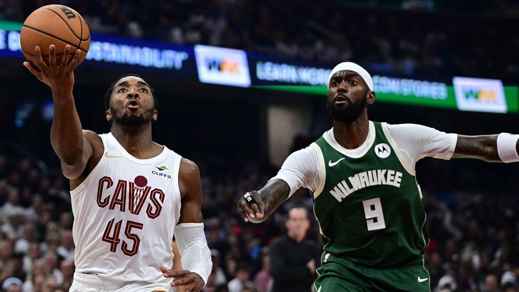 Donovan Mitchell driving to basket for Cleveland Cavaliers in 2025 NBA game