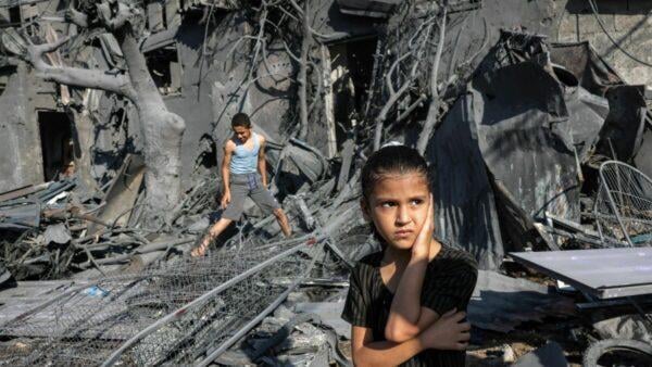 Child in Gaza shows emotional trauma amid war destruction