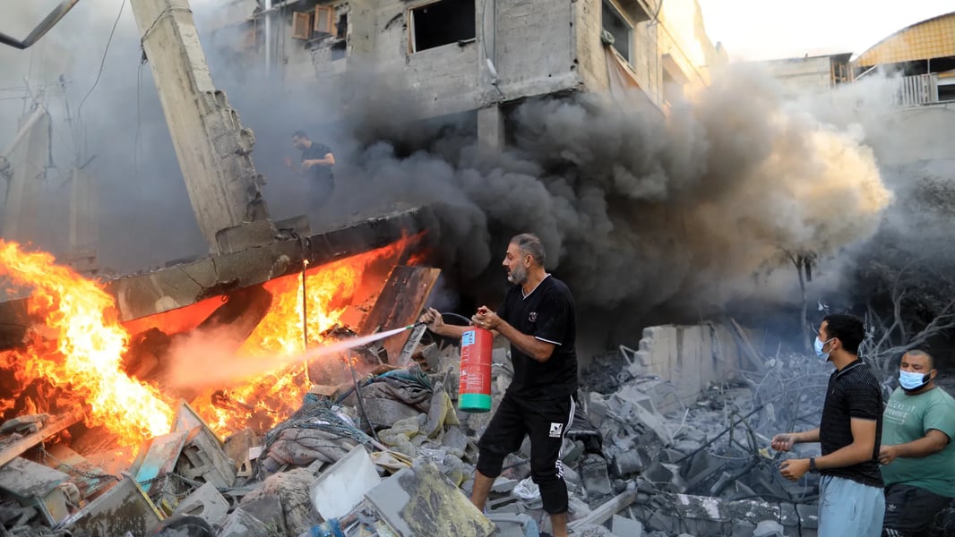 Israeli airstrike rubble Khan Younis kills two Gaza children despite ceasefire