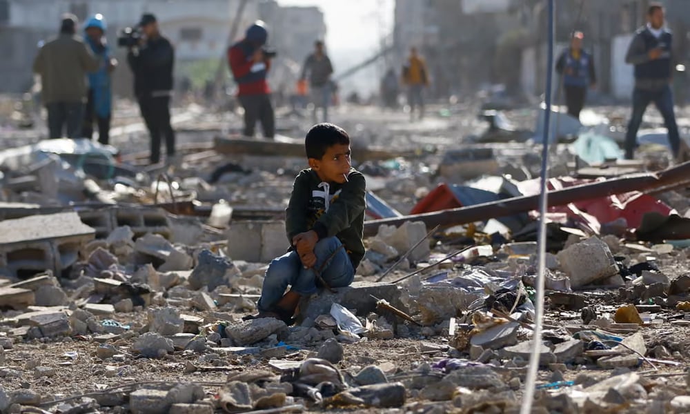 Devastated Gaza neighborhood with displaced Sudanese civilians