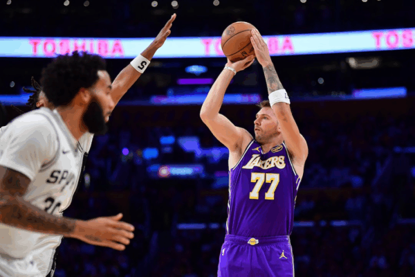 Luka Dončić of the Los Angeles Lakers shoots over San Antonio Spurs defender during 118-116 comeback victory on November 6, 2025