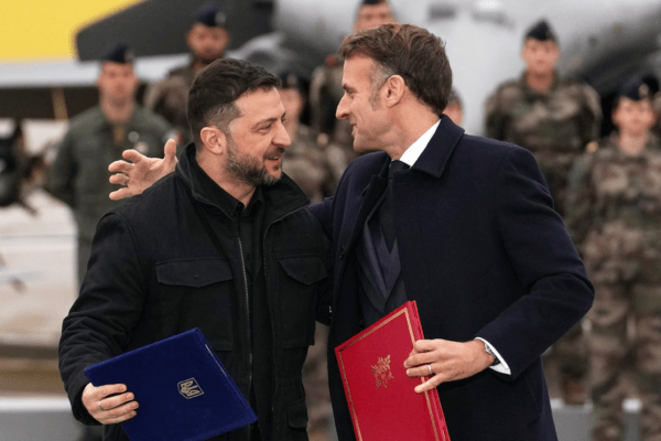 Macron and Zelensky signing Rafale jets deal at Villacoublay air base