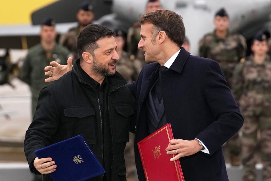 Macron and Zelensky signing Rafale jets deal at Villacoublay air base