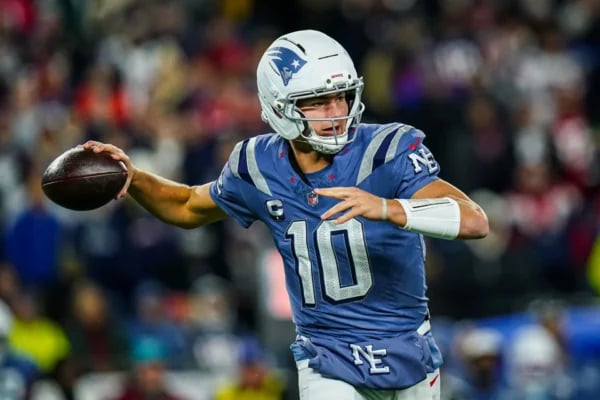 NFL Week 13 football action as teams battle for top rankings