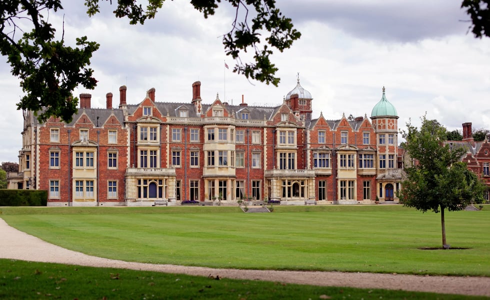 Sandringham House estate exterior showing Victorian Jacobean architecture and landscaped grounds