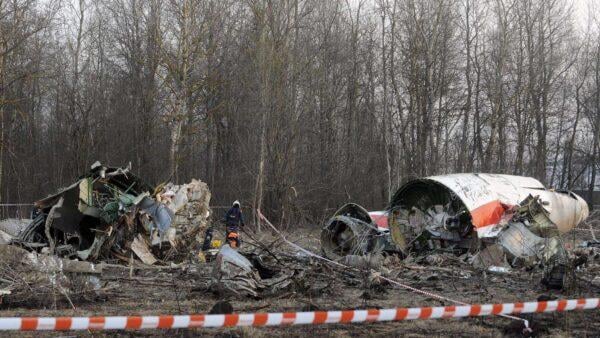 Memorial for victims of the Smolensk plane crash with Polish flags
