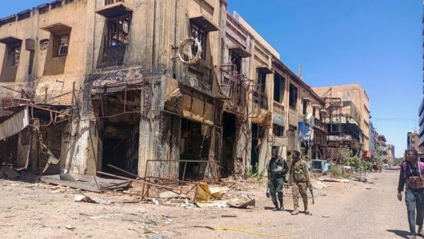 Armed Rapid Support Forces fighters patrolling streets of El-Fasher amid Sudan civil war 2025