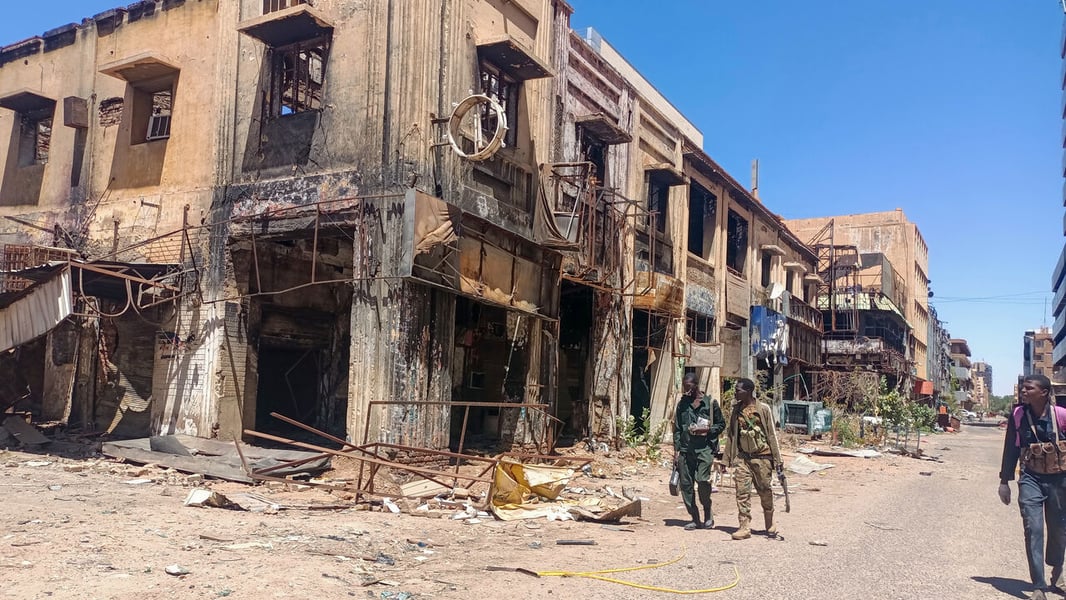 Armed Rapid Support Forces fighters patrolling streets of El-Fasher amid Sudan civil war 2025