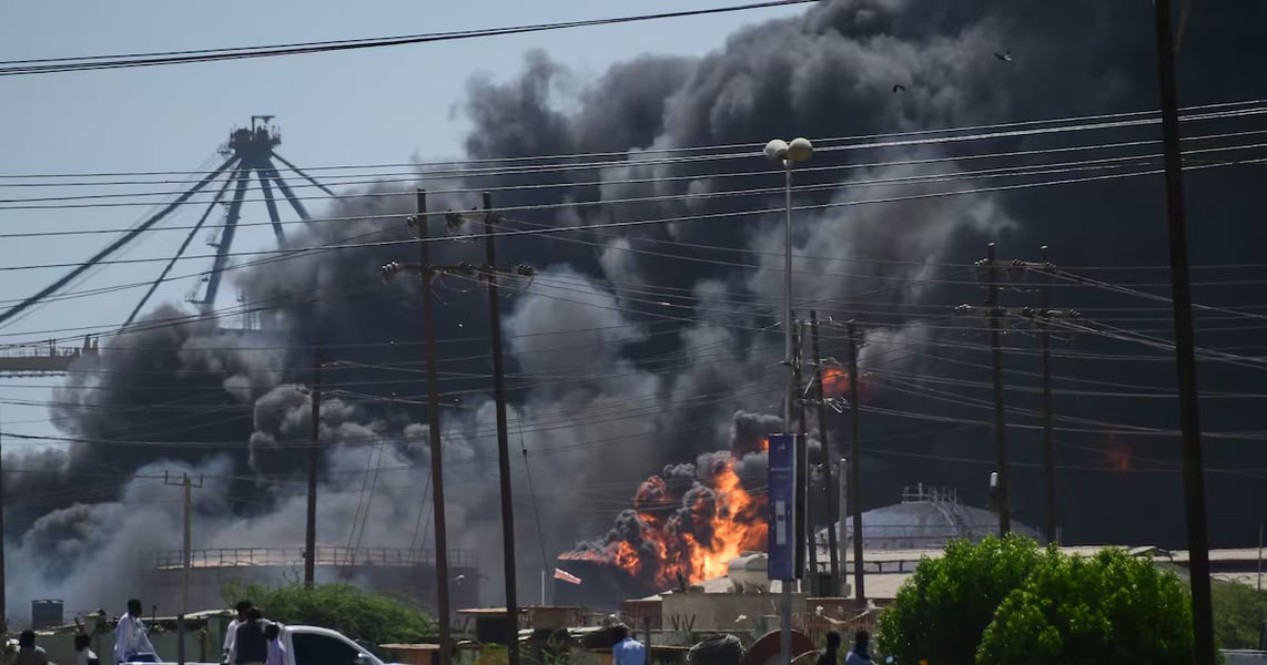 Smoke rising over a city in North Kordofan, Sudan after deadly attack on civilians