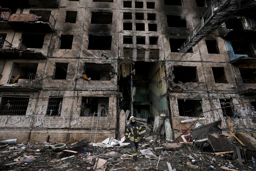 Humanitarian Toll Mounts as Russian Attacks Kill 11 Civilians Damaged residential building in Ukraine after Russian drone strike showing humanitarian impact of war