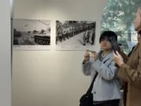 A visitor clicking photo at soviet-korean-liberation gallery