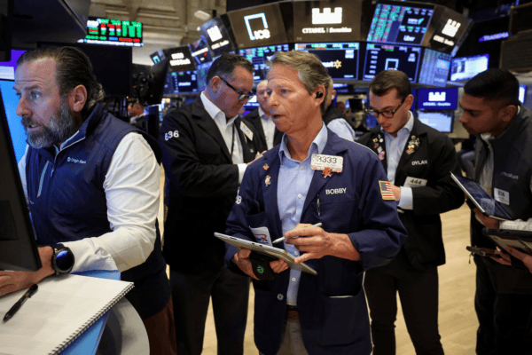 Wall Street traders react to Nvidia AI earnings, sparking stock rally and bubble fears