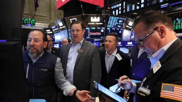 Wall Street traders at New York Stock Exchange during volatile market session