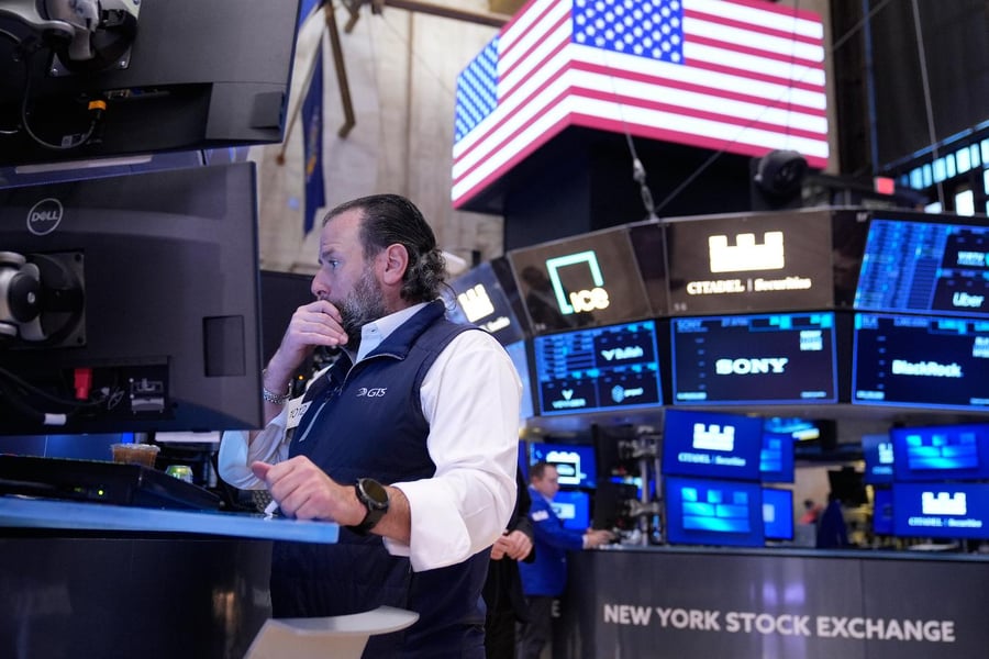 Wall Street trading floor showing market volatility ahead of Nvidia earnings report