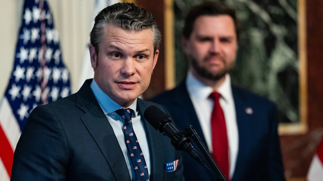 Hegseth Defends Admiral Bradley Boat Strike Decision Defense Secretary Pete Hegseth at Pentagon briefing discussing boat strike authorization