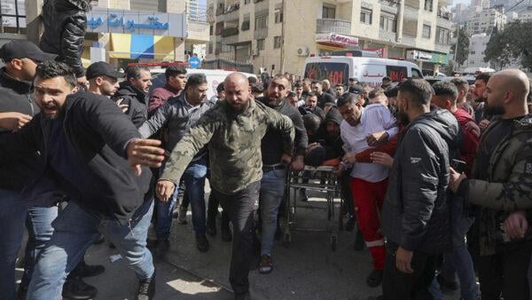 Israeli forces raid Jenin in the occupied West Bank where a Palestinian child was killed