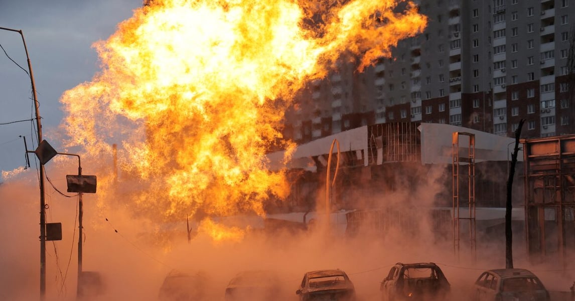 Burning trucks and rescue crews at Odesa port after Russian ballistic missile strike on day 1395