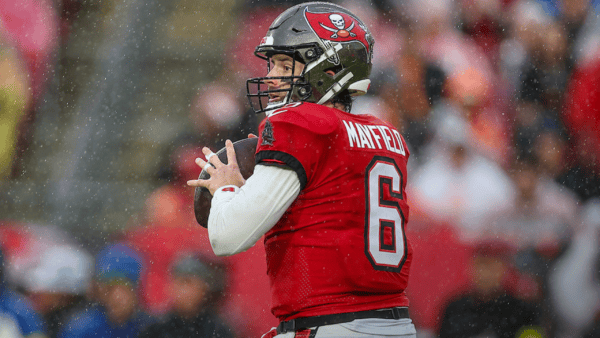 Baker Mayfield scrambles with football during Buccaneers 16-14 victory over Panthers in NFC South race