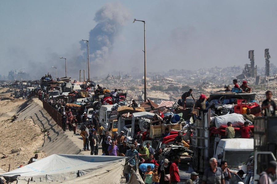 Palestinian families flee their homes in Gaza after Israeli evacuation orders backed by Western governments