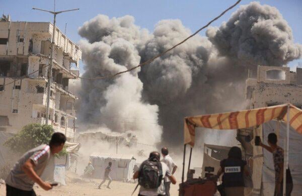 Gaza city devastated by Israeli airstrikes, highlighting civilian destruction and humanitarian crisis