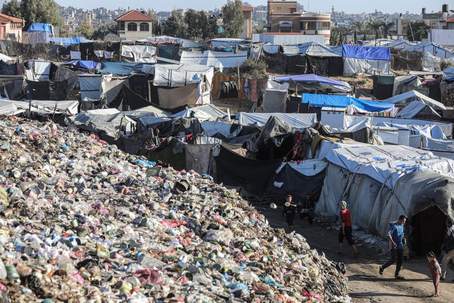 Palestinian families live in toxic tent camps in Gaza as Israel’s war and Western-backed siege collapse sanitation and health systems