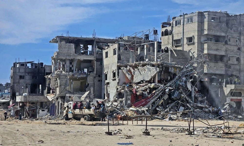 Gaza Hospitals Collapse Amid Israeli Attacks Medical staff treating injured in damaged Gaza hospital