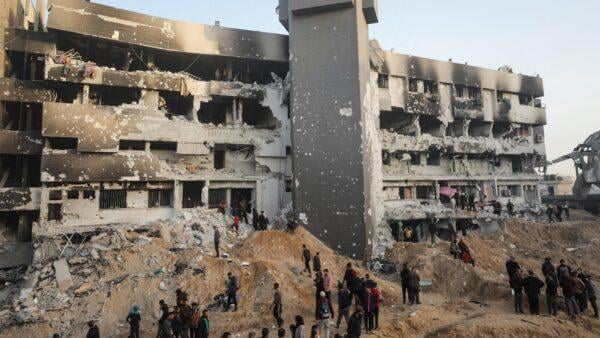 Gaza genocide graffiti on Al-Shifa Hospital ruins