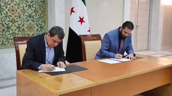 Syrian officials and Kurdish SDF representatives finalize a ceasefire agreement after weeks of fighting in northern Syria