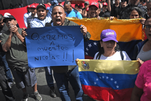 Venezuelans hold vigils mourning victims of the US military invasion that captured Maduro